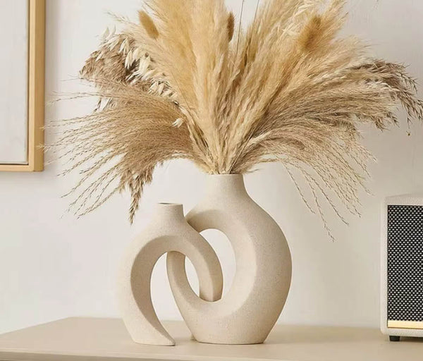 Nordic Bloom ceramic vase set with pampas grass decor, sculptural sand-textured finish in neutral beige, styled on console table.