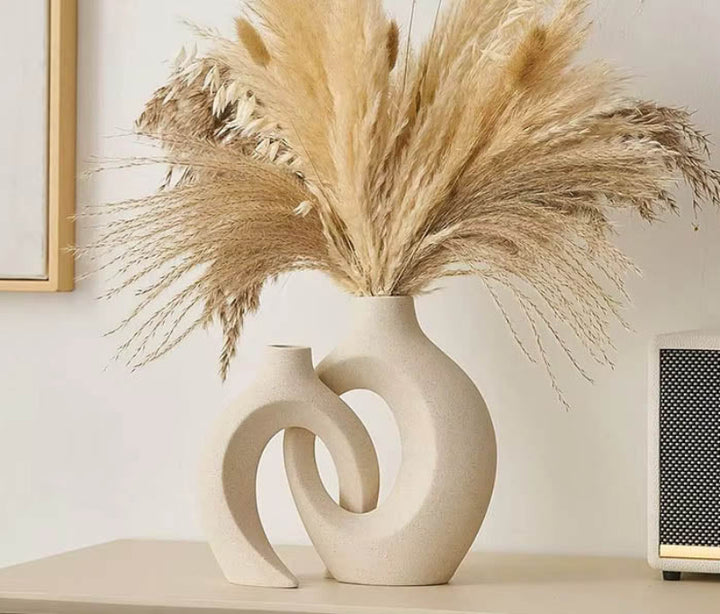 Nordic Bloom ceramic vase set with pampas grass decor, sculptural sand-textured finish in neutral beige, styled on console table.