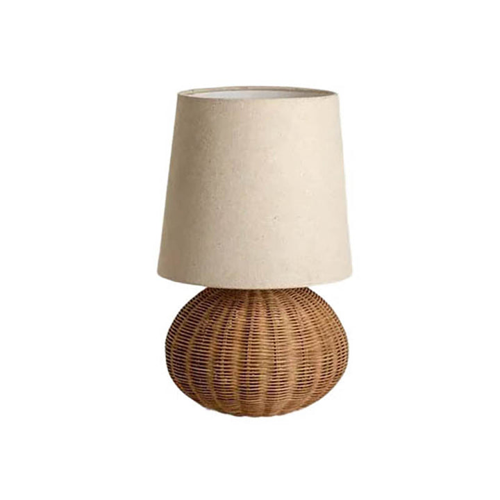 Small LUN rattan round table lamp with natural woven base and cream fabric shade, Nordic Essentials bedside lighting.