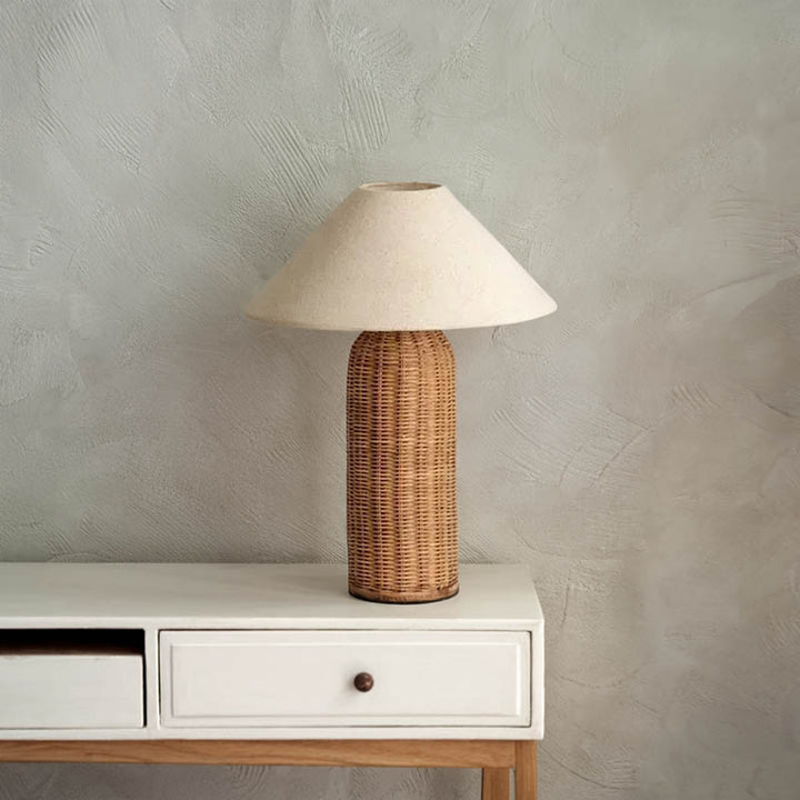 Large LUN rattan lamp on table, in minimalist Nordic uk bedroom with neutral decor