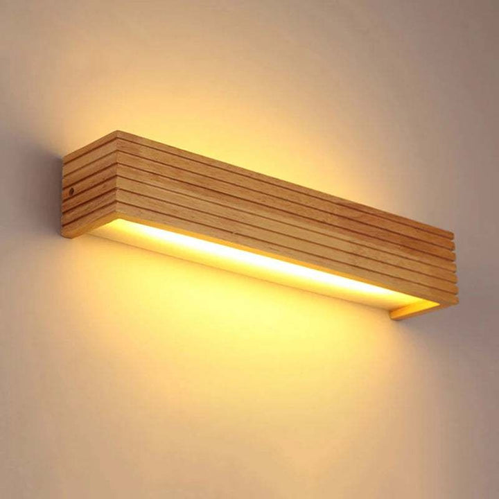 LYSE modern wooden LED wall lamp with horizontal slatted design and warm light glow