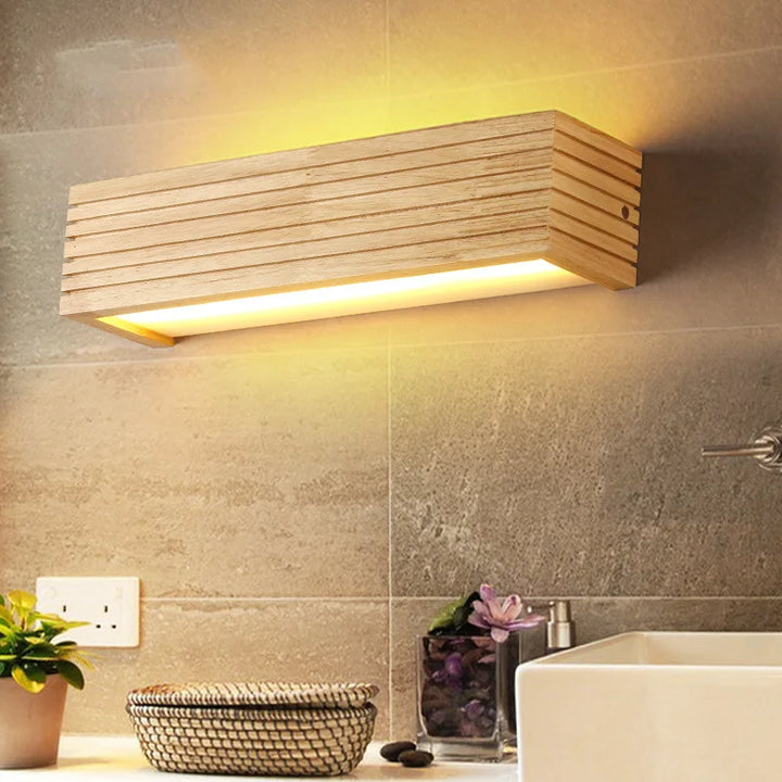 LYSE wooden LED wall light mounted on tiled bathroom wall for warm illumination
