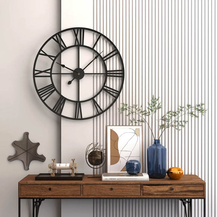 Minimalist black metal Roman numeral wall clock, 40cm, Scandinavian-style hallway clock with decorative console table.