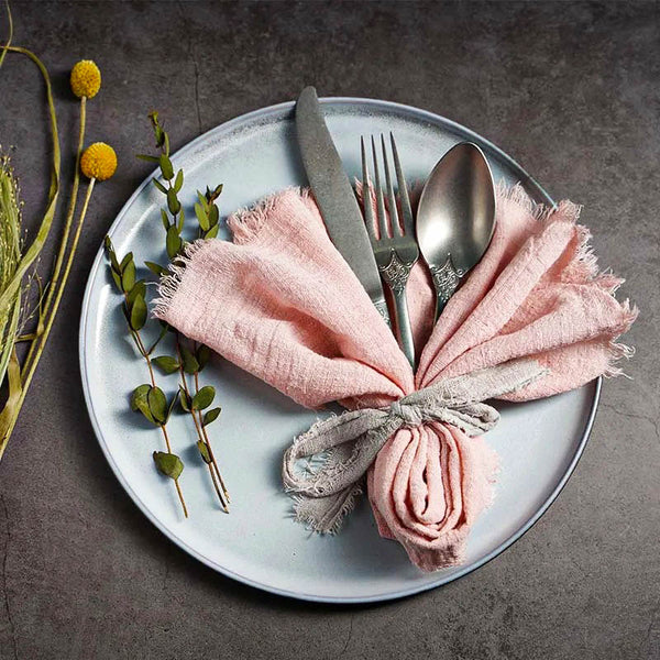Pink cotton napkin tied with grey ribbon on plate with vintage cutlery, 41 × 41cm – ideal for weddings and rustic dining.