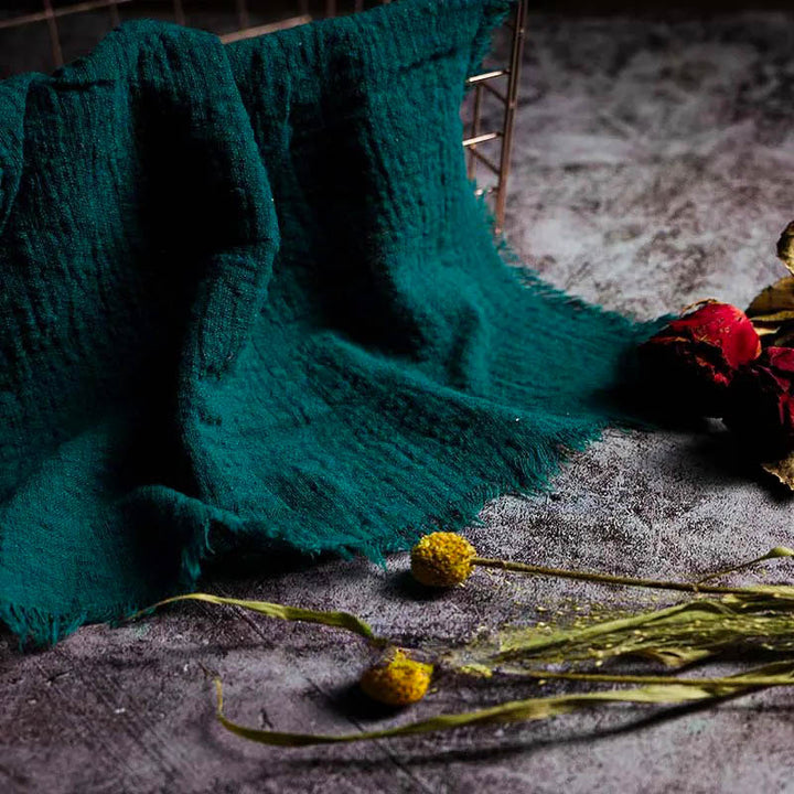 Deep teal cotton gauze napkin with raw edge detailing, 41 × 41cm – modern table linen for rustic or Nordic-inspired home decor.