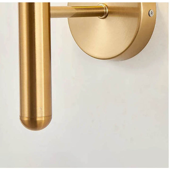 Close-up of brushed brass wall sconce mount, MAELKEBOLD modern light fixture with sleek anti-corrosion finish.