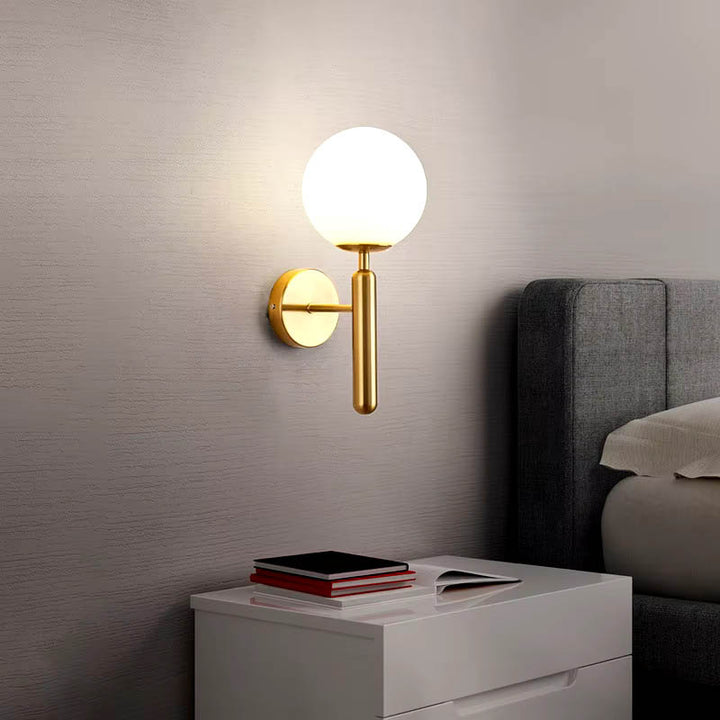 Modern glass ball wall light with a minimalist Nordic design, featuring a sleek metal base and opal glass shade for soft, ambient lighting.