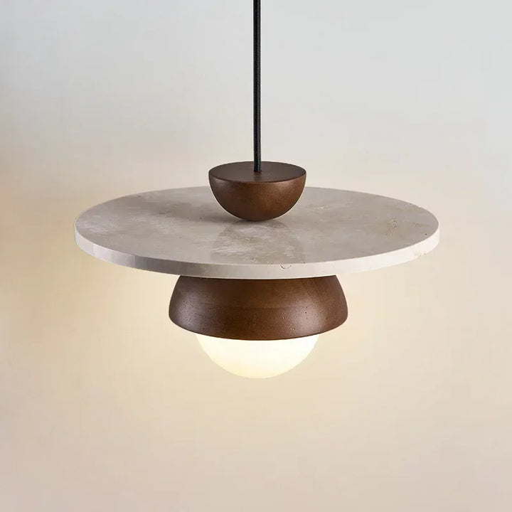 Nordic walnut and stone LED pendant lamp with globe diffuser in soft lighting