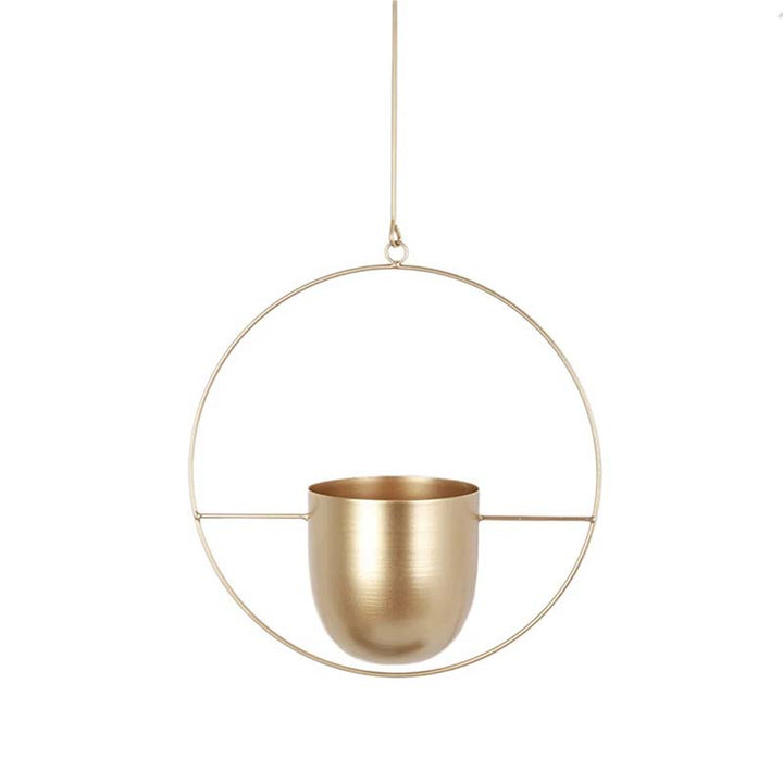 Gold hanging planter with circular frame on a white background