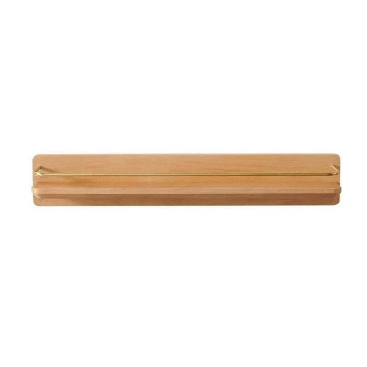 Natural bamboo wall rack with brass rail and towel bar, perfect for Japandi or Scandinavian interiors