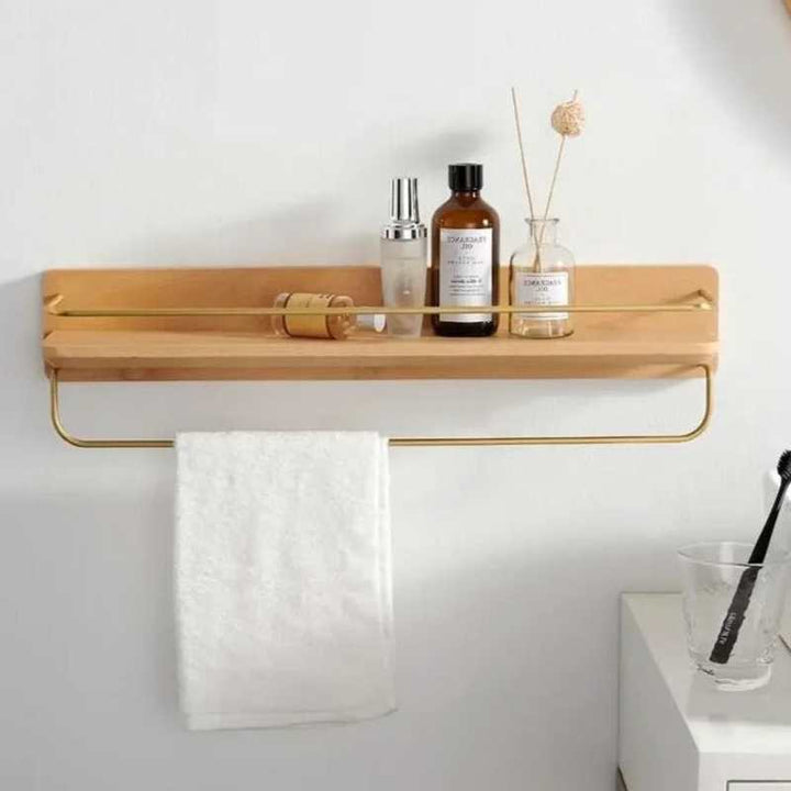 Natural bamboo floating shelf with towel rail, perfect for displaying decor and daily essentials