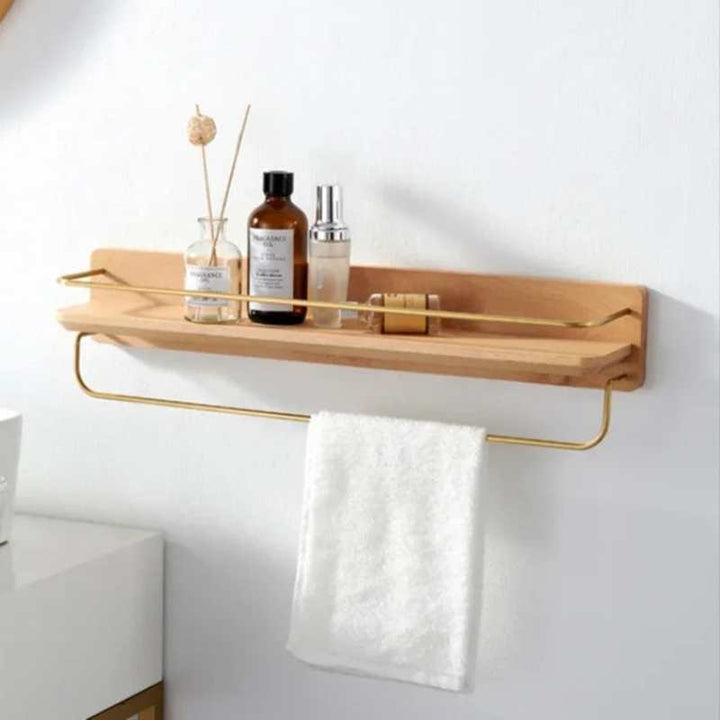 Large dark bamboo wall shelf with gold bar, ideal for organizing skincare or perfume bottles