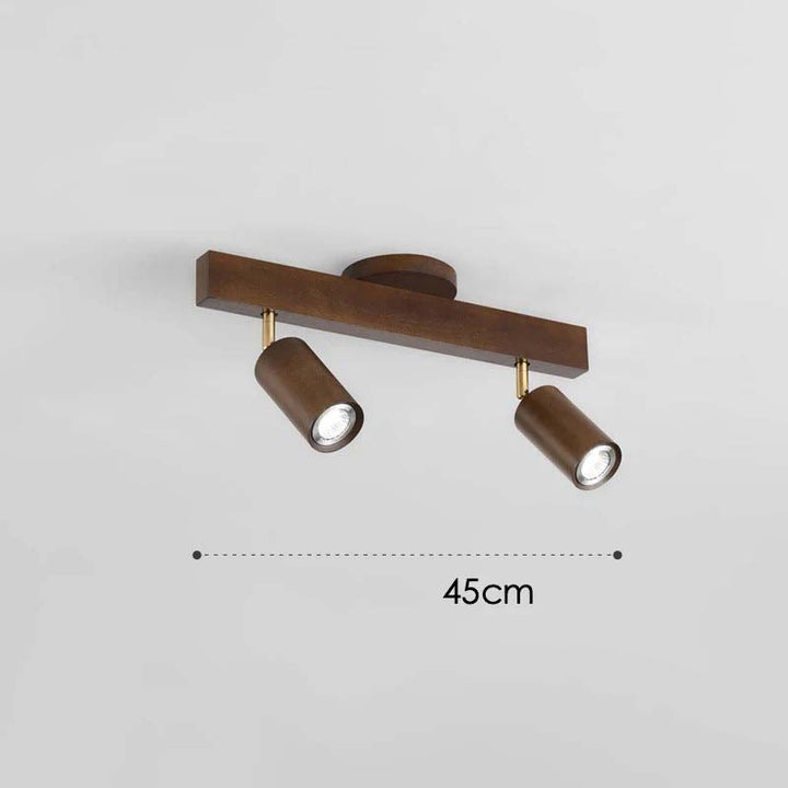 Bronze ceiling light fixture with two cylindrical lights on a gray background, showing measurement of 45cm.