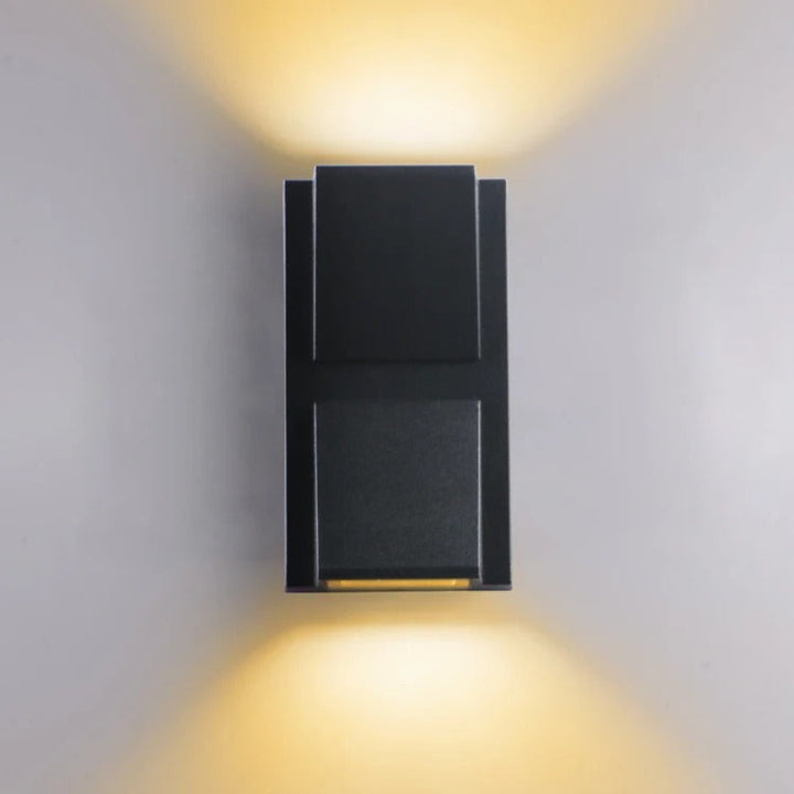 Up&Down outdoor Black wall-mounted light fixture on a gray wall
