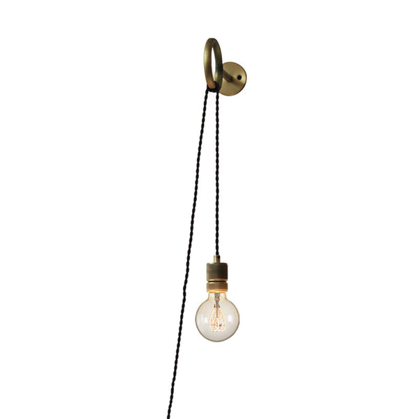 Wall-mounted light fixture with a hanging bulb on a white background