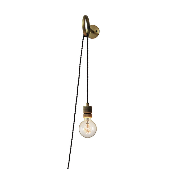 Wall-mounted light fixture with a hanging bulb on a white background