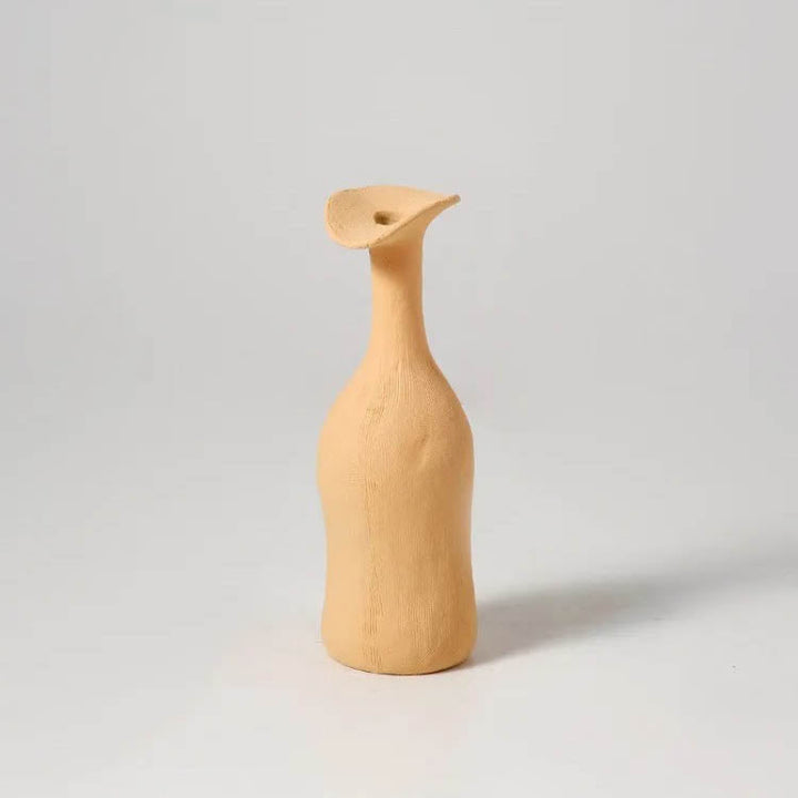 Small matte yellow ceramic vase with sculptural curved rim, minimalist Scandi home accessory for shelves or tables