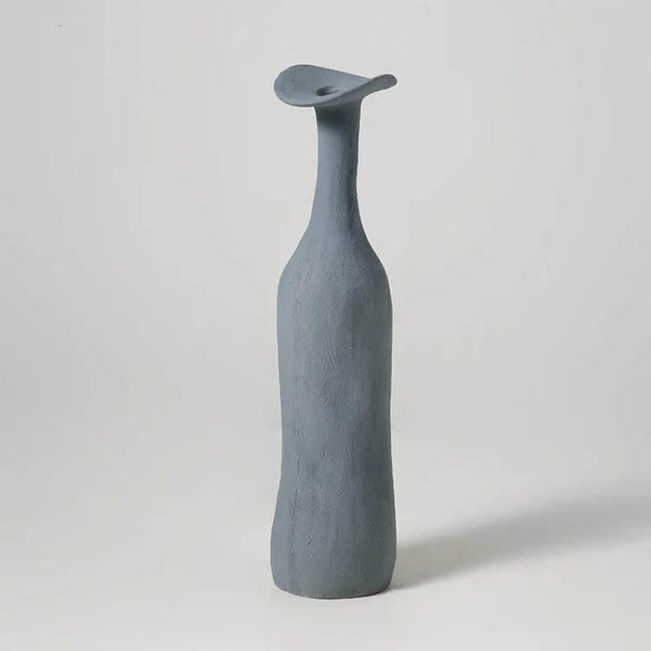 Tall matte blue ceramic vase with unique sculpted neck, Nordic-style decorative piece for modern UK interiors