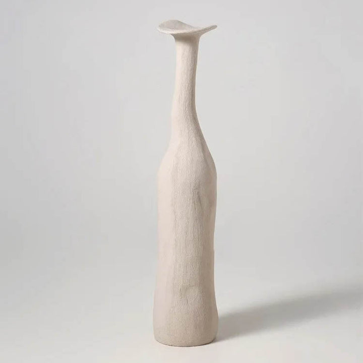Textured white ceramic vase with organic sculptural shape, ideal for neutral-toned Nordic interior styling