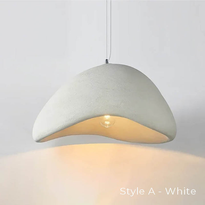 HAETTE Style A in white, curved cement texture with soft interior lighting, suspended for dining or living area