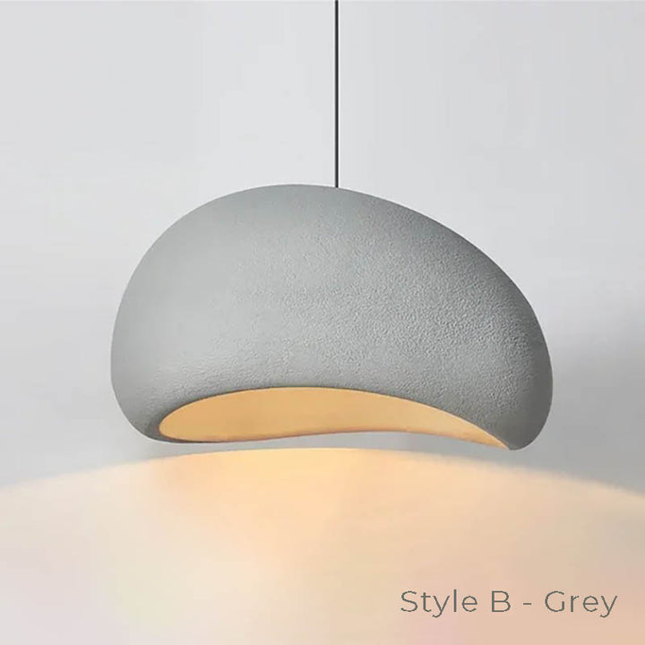 HAETTE Style B pendant in grey with smooth dome shape and warm light, minimalist design