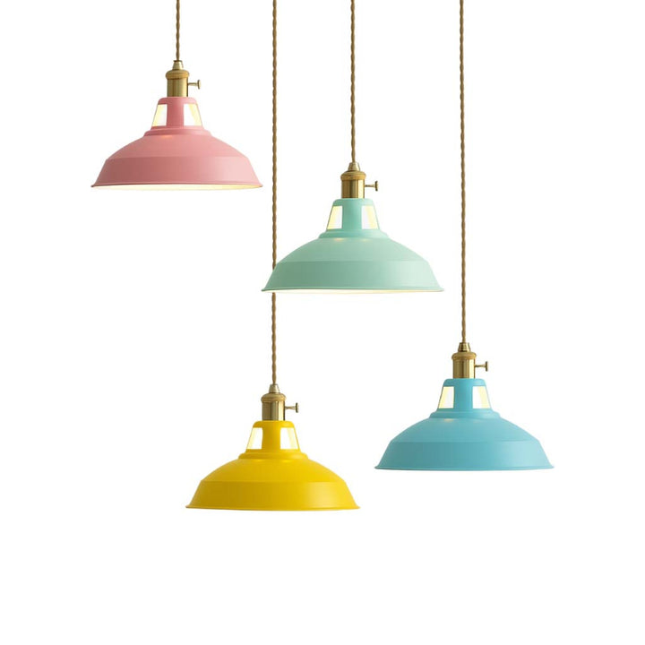 Four colorful pendant lights hanging against a white background