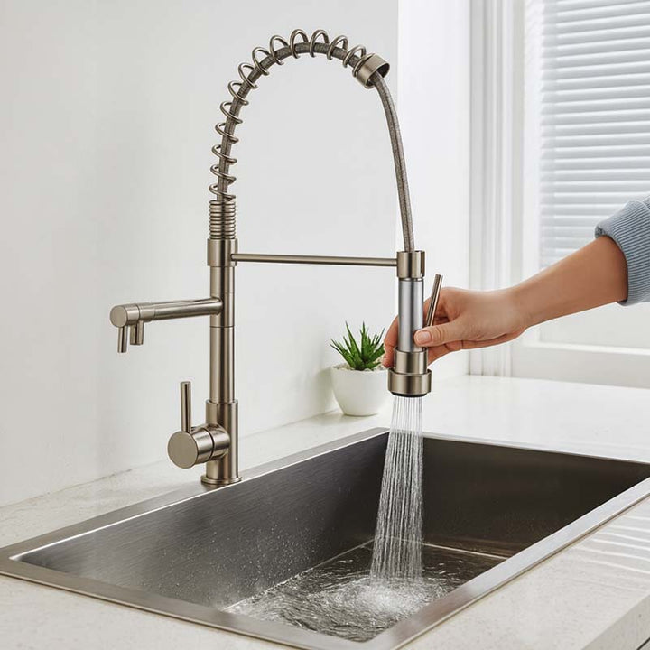 Modern kitchen faucet with water flowing into a sink