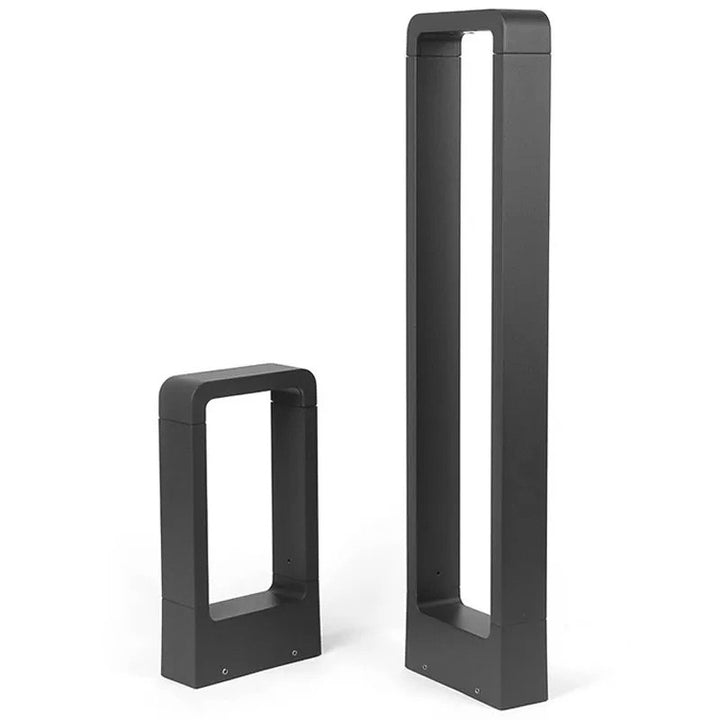 Two black aluminum  Modern outdoor LED ground lamp on white background a white background