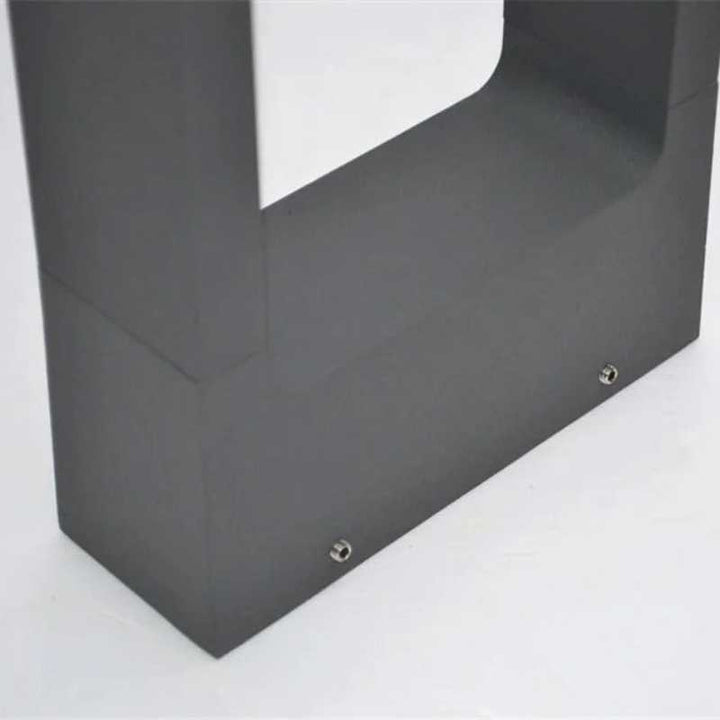 Close-up of the bottom of the LED  Modern outdoor LED ground lamp on white background