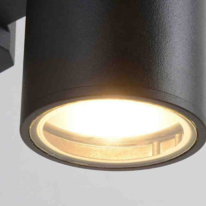 Close-up of LED light fixture showing soft warm glow and clear lens detailing.