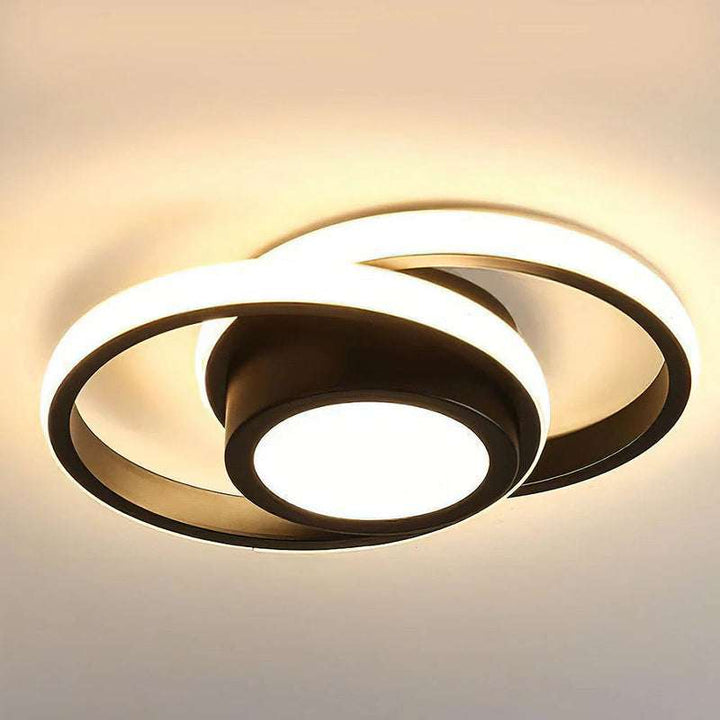 Modern flush mount ceiling light with double LED rings in matte black finish