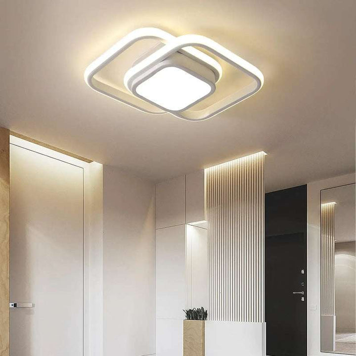 White square LED flush mount ceiling light with double frame in bright entryway