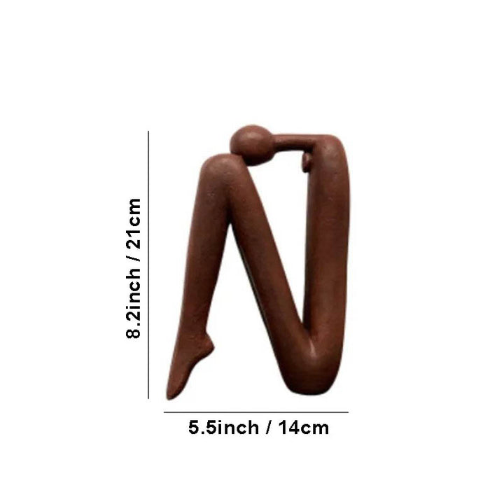 Brown minimalist thinker bookend sculpture, 21cm tall by 14cm wide, modern resin ornament for contemporary home offices