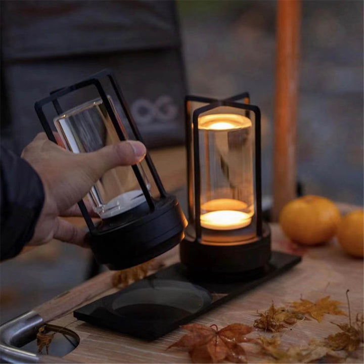 Hand-held USB LED lantern in black, portable KRYSTAL lamp ideal for camping or travel use.