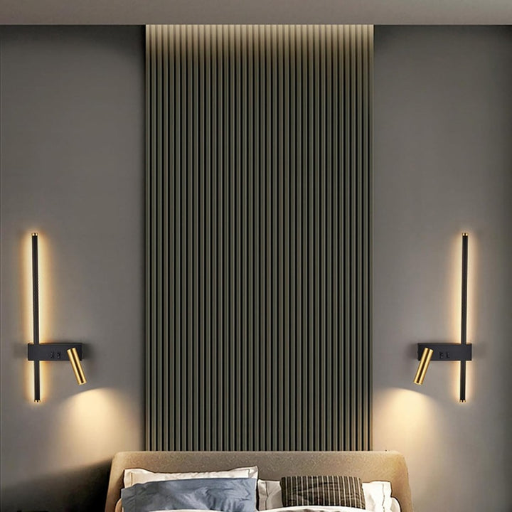 Modern wall-mounted lights on a gray wall with a textured panel