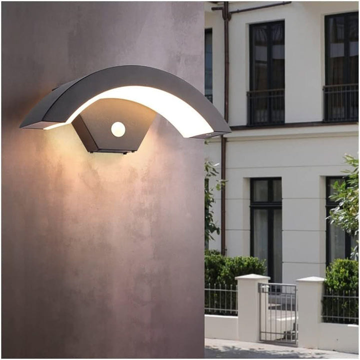 Modern outdoor wall light fixture on a building exterior.