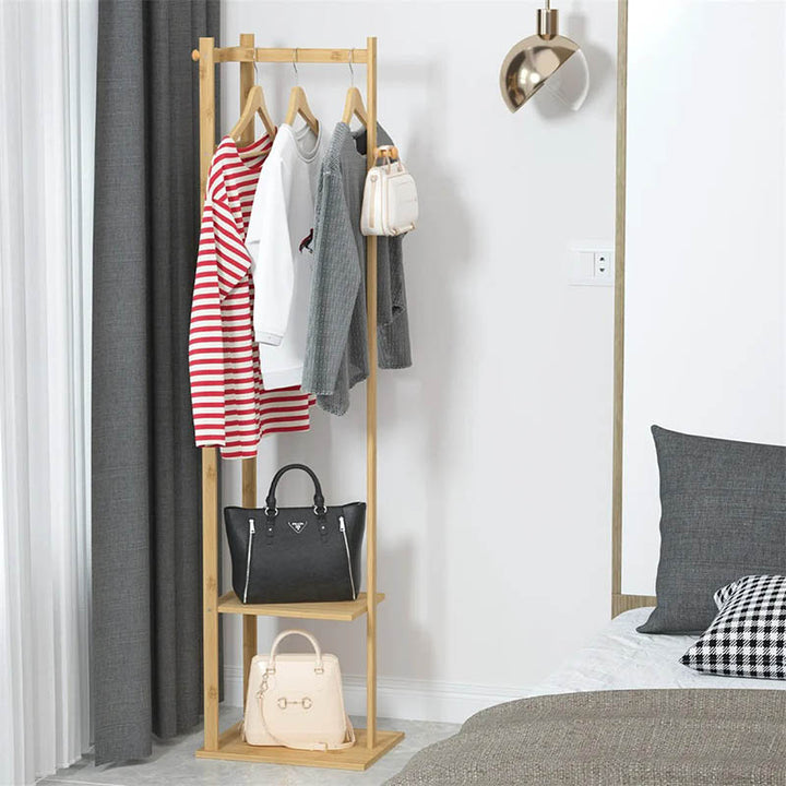 Slim bamboo bedside coat stand with stable base, Scandi-style organiser for modern uk rooms