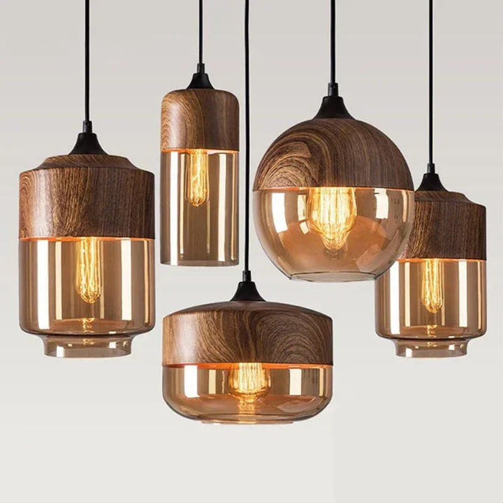 Set of nordic pendant lights with glass shades on a neutral background