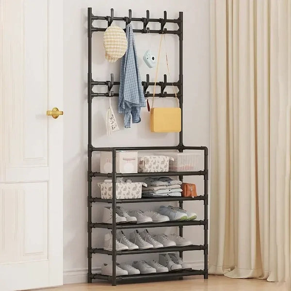 Black freestanding hallway organiser with coat hooks and 5-tier shoe shelf, minimalist plastic frame, ideal for UK entryways or bedrooms.