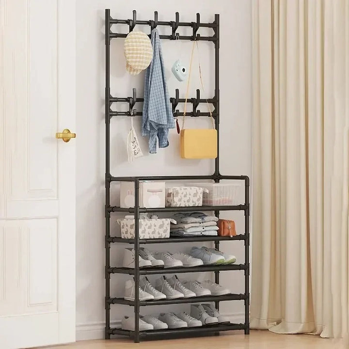 Black freestanding hallway organiser with coat hooks and 5-tier shoe shelf, minimalist plastic frame, ideal for UK entryways or bedrooms.