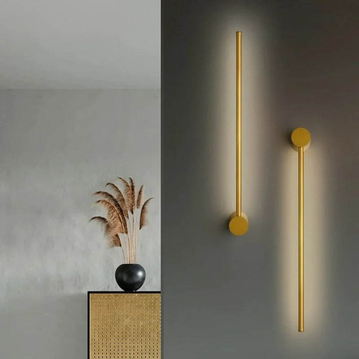 Gold LINJE Nordic LED Wall Light with adjustable rotating design, crafted from premium aluminium with a baked paint finish. Sleek, modern wall lamp for accent or ambient lighting in bedrooms, hallways, and living spaces. Example 3