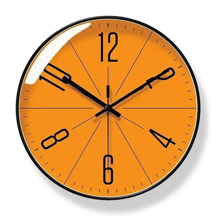 Modern orange wall clock with bold black hands and numbers – Nordic-style silent clock for UK living room, office, or café interiors.