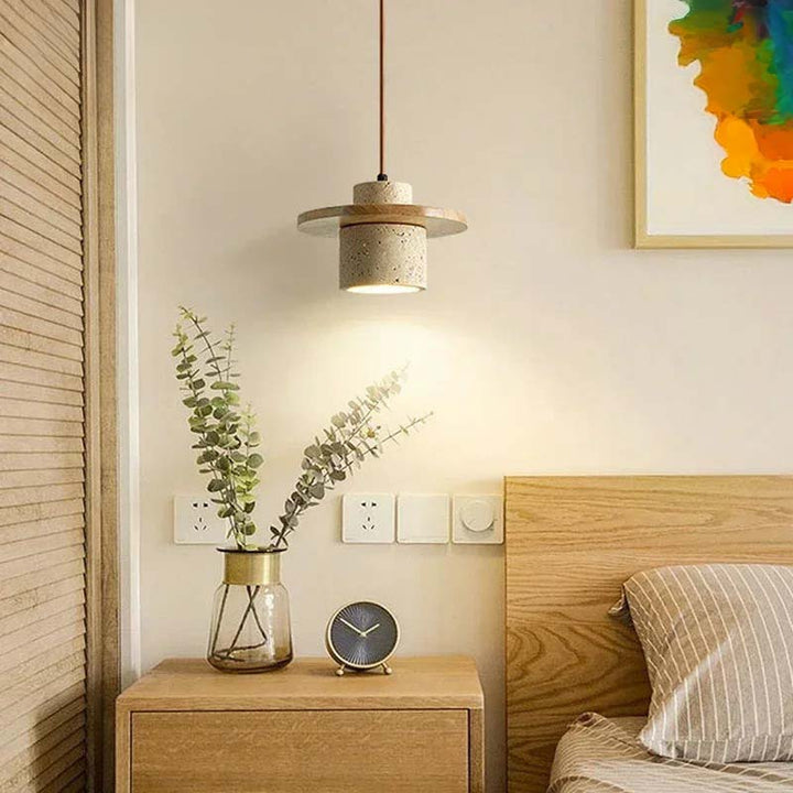 Nursery room with wooden nightstand, lamp, and decorative elements.