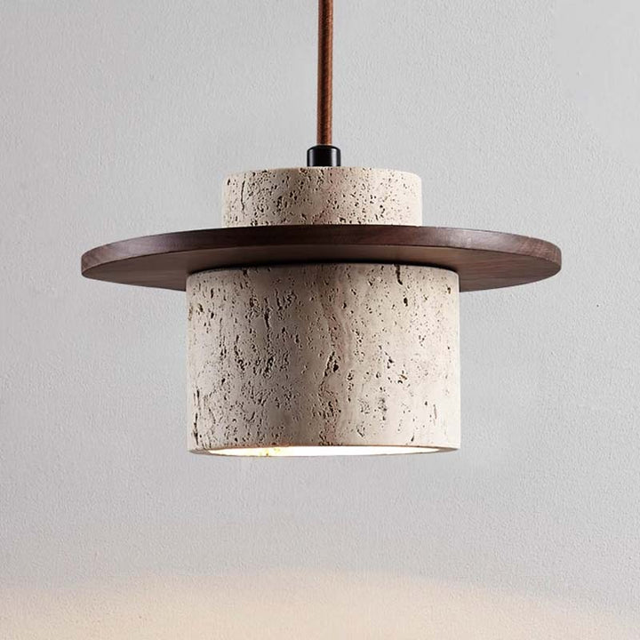Pendant light with stone-like finish and wooden shade on a neutral background