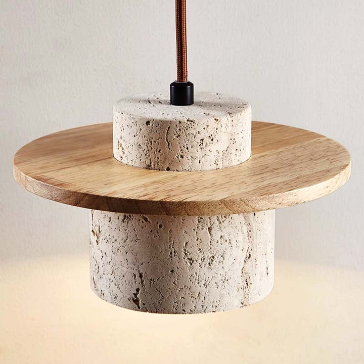 Pendant light with stone base and wooden shade on a neutral background