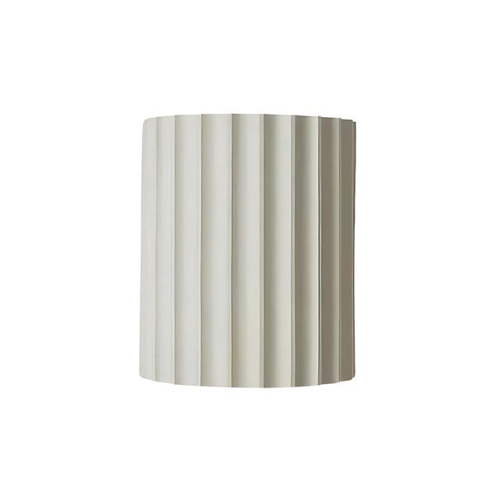 Striped cylindrical lampshade on a white background