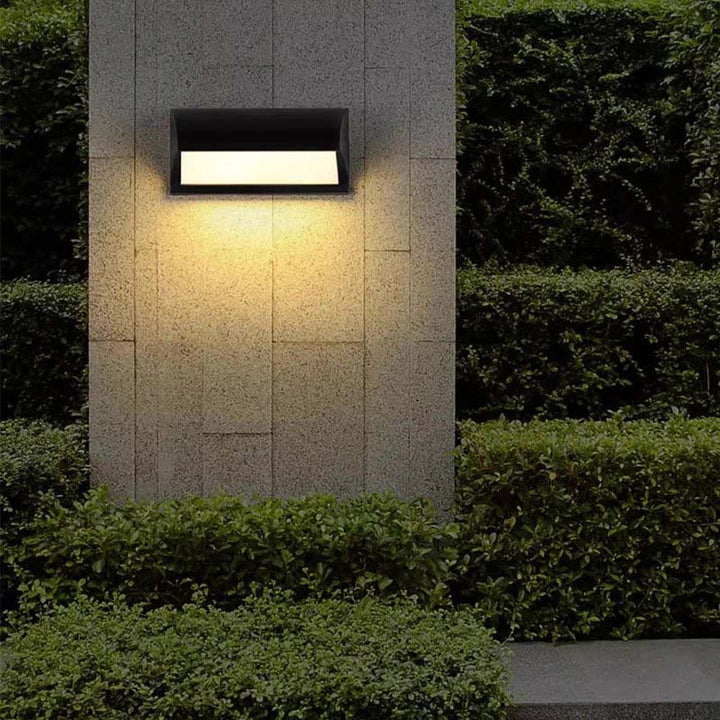 Nordic Essentials Outdoor Wall Light on hedge – IP66 waterproof black LED lamp for UK driveway, patio, and porch security