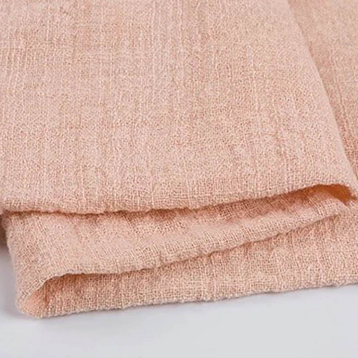 Folded peach cotton napkin for Weddings and Elegant uk Dining Decor uk