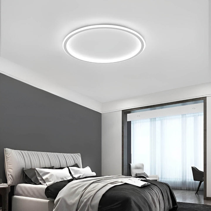 White RUND Nordic LED ceiling light, 60cm, showcasing sleek Scandinavian design in a contemporary living room