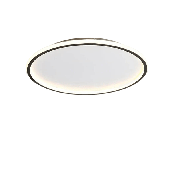 Nordic Essentials RUND LED ceiling light in black, 30cm, illuminating a modern bedroom with adjustable brightness.